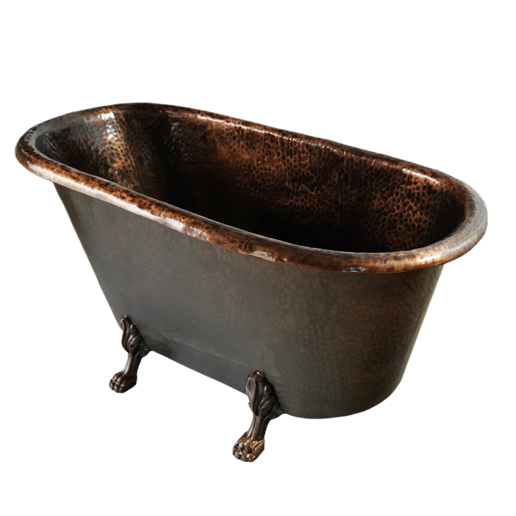 Freestanding Antique Copper bathtub with varied texture for classic residential spaces
